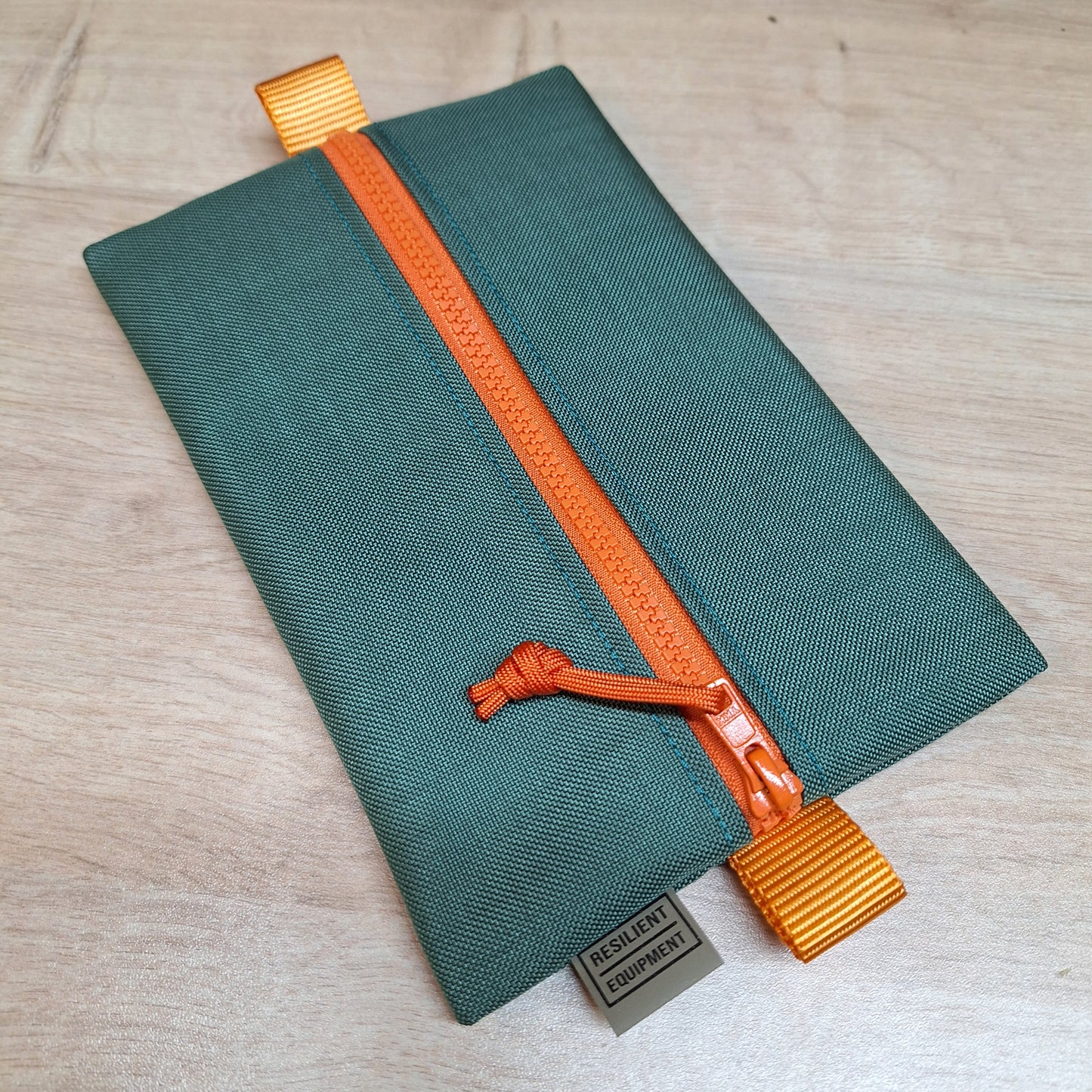 Bronze Green Medium Centre Zip Pouch with Orange Zip and Lining